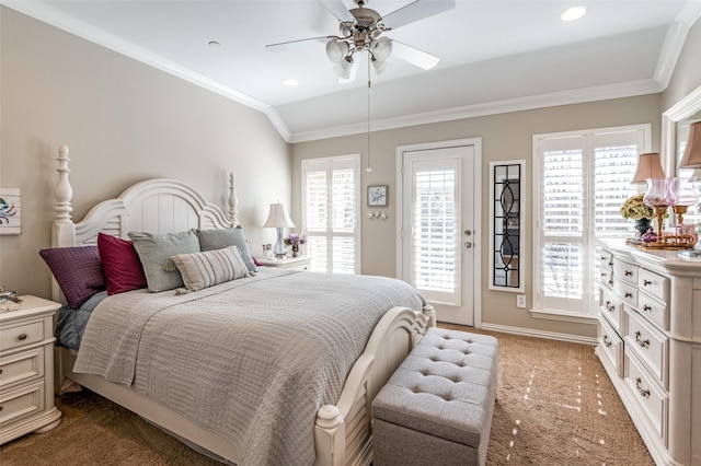 bedroom featuring ceiling fan, access to outside, multiple windows, and dark colored carpet