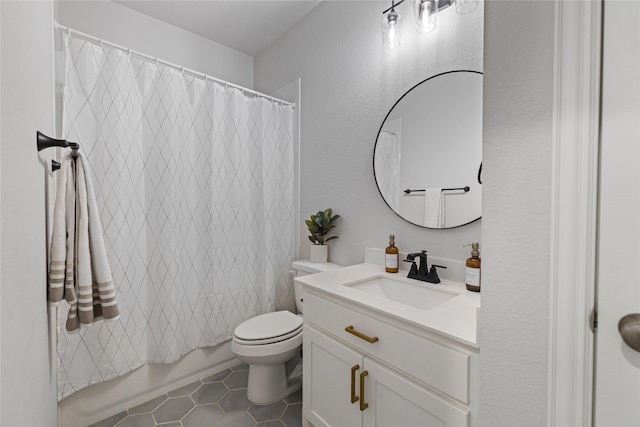 full bathroom featuring toilet, shower / bathtub combination with curtain, tile patterned floors, and vanity