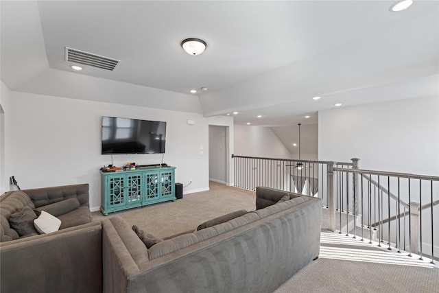 living room with carpet and lofted ceiling