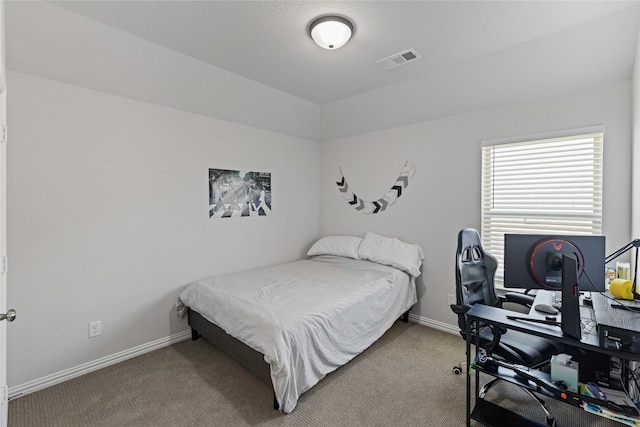 bedroom featuring carpet