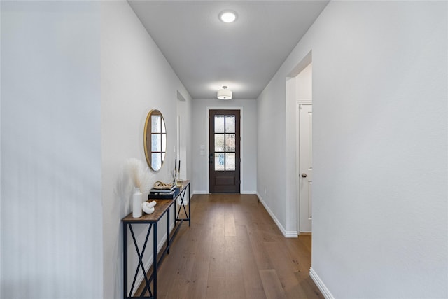 doorway featuring hardwood / wood-style flooring