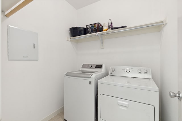 laundry area with independent washer and dryer