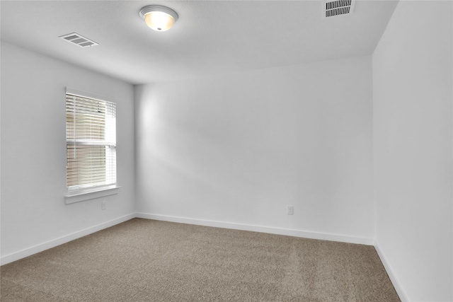 empty room featuring carpet floors