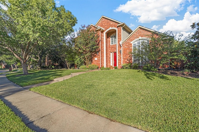 view of front of home with a front yard