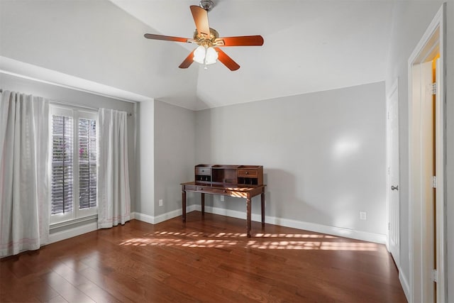 office with ceiling fan, dark wood-type flooring, and vaulted ceiling