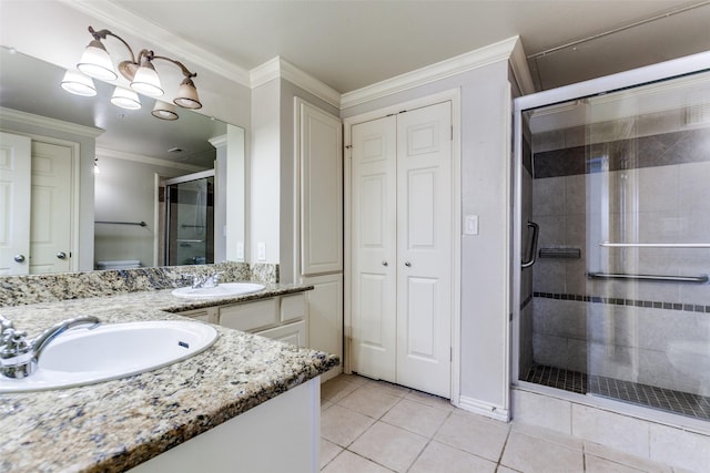 bathroom with ornamental molding, toilet, tile patterned floors, and walk in shower