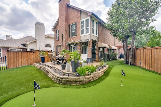 rear view of house featuring a patio area