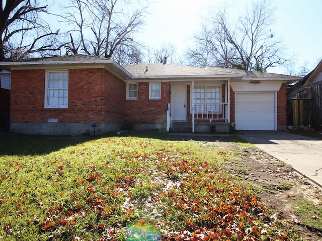 single story home featuring a front yard and a garage