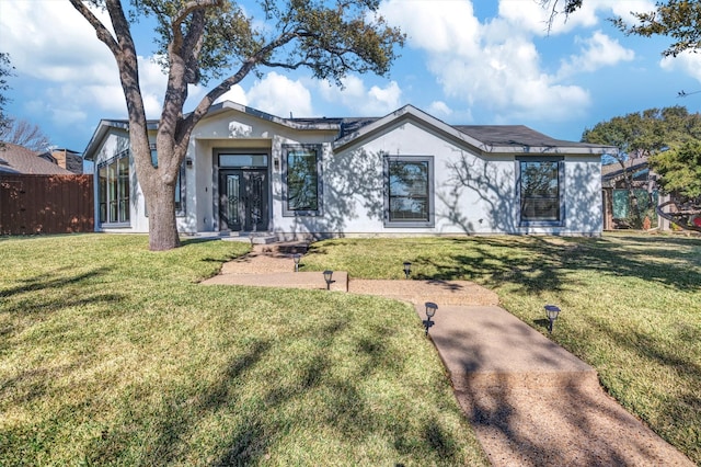 view of front of home featuring a front lawn