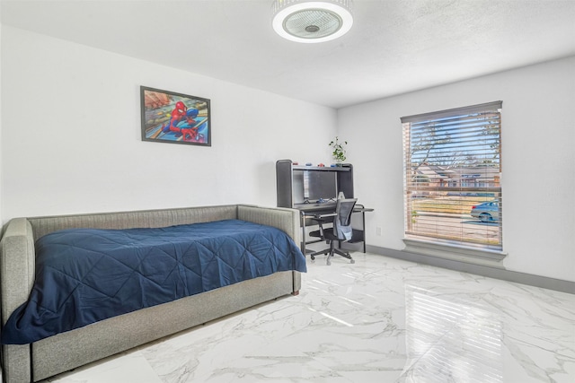 bedroom with a textured ceiling