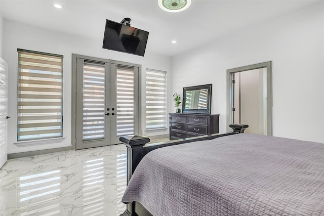 bedroom featuring access to exterior and french doors