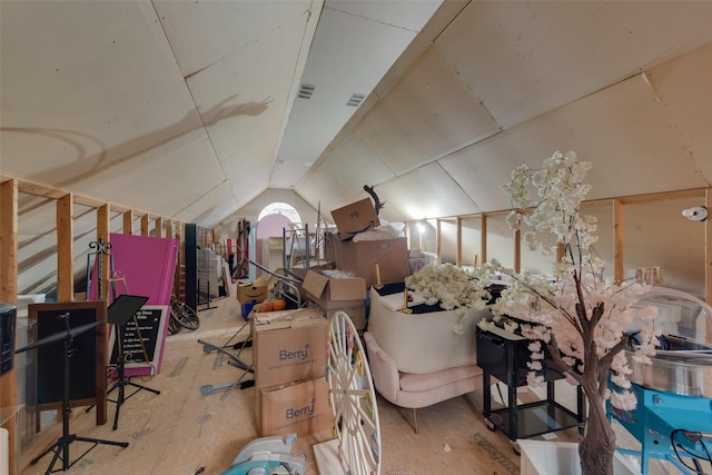 additional living space featuring vaulted ceiling