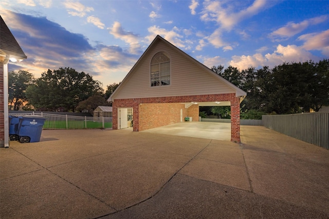 view of property exterior at dusk