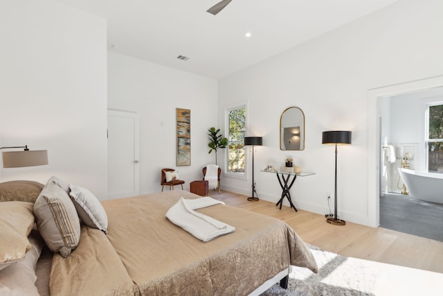 bedroom featuring ceiling fan and light wood-type flooring