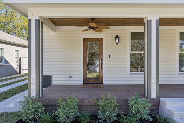 property entrance featuring ceiling fan and covered porch