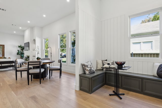 interior space featuring breakfast area and light hardwood / wood-style flooring