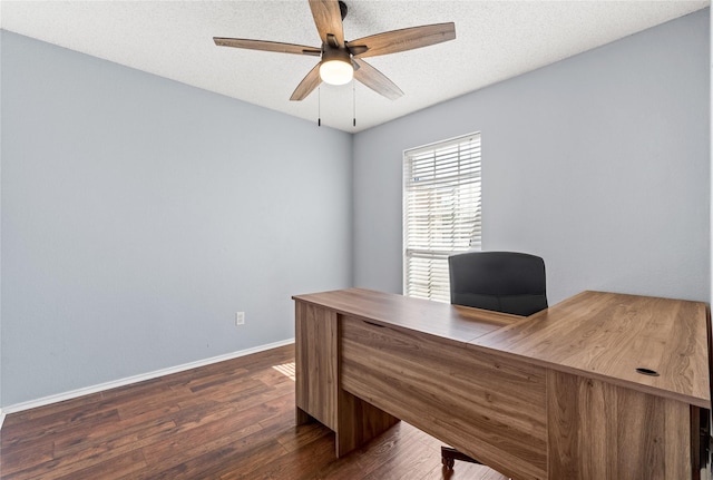 office area featuring a textured ceiling, ceiling fan, and dark hardwood / wood-style flooring