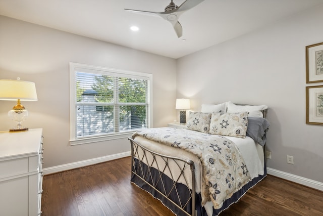 bedroom with dark wood-type flooring and ceiling fan