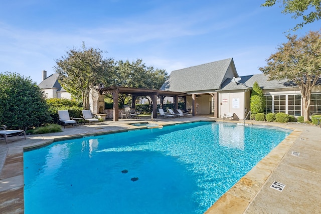 view of pool featuring a patio area and a pergola