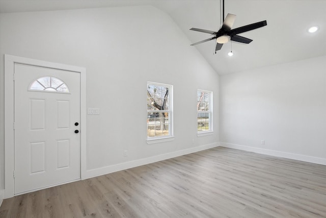 foyer entrance with light wood finished floors, baseboards, a ceiling fan, high vaulted ceiling, and recessed lighting