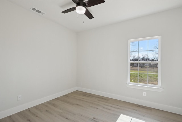 unfurnished room featuring ceiling fan and light hardwood / wood-style floors