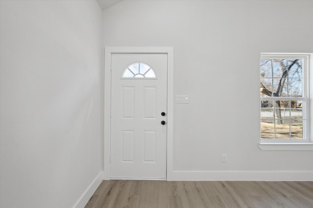 entrance foyer with light hardwood / wood-style floors