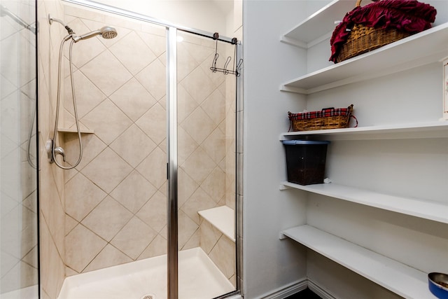 bathroom featuring an enclosed shower