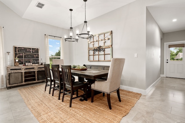 dining space featuring a chandelier