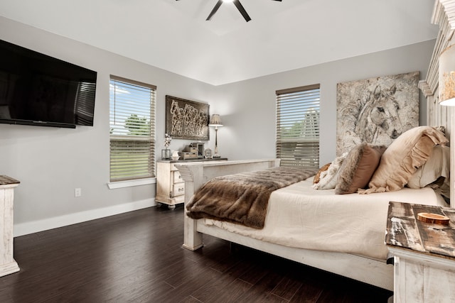 bedroom with multiple windows, ceiling fan, and dark wood-type flooring