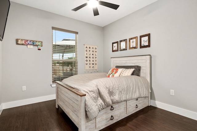 bedroom featuring ceiling fan and dark hardwood / wood-style flooring