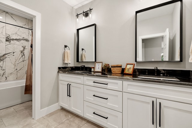 bathroom featuring shower / bathtub combination with curtain and vanity