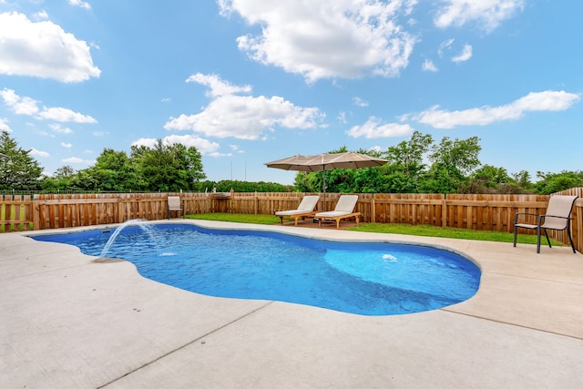 view of pool with pool water feature and a patio area