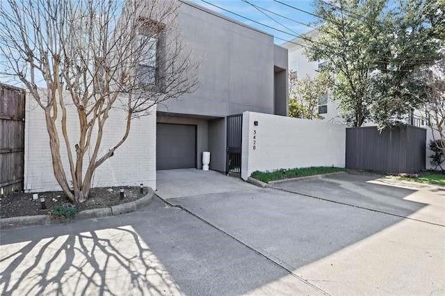 view of side of property featuring a garage