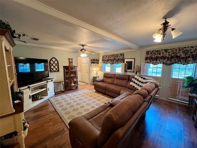 living room with hardwood / wood-style flooring, a textured ceiling, ceiling fan, and ornamental molding