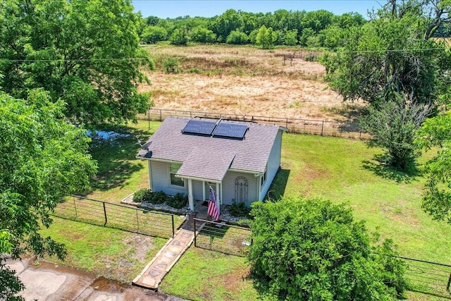 birds eye view of property with a rural view