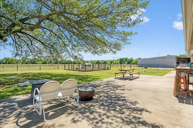 view of patio / terrace featuring a rural view