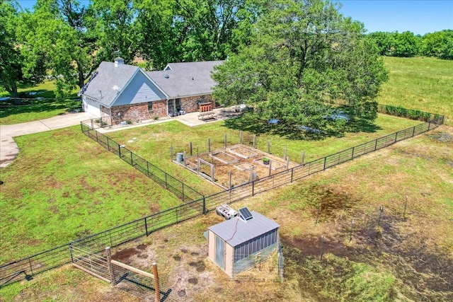 birds eye view of property with a rural view