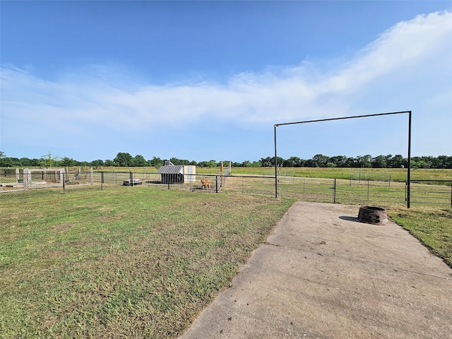 view of yard with a rural view