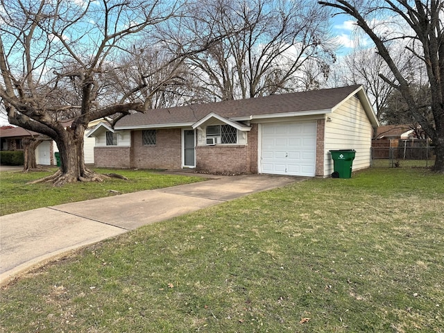 single story home with a front yard and a garage