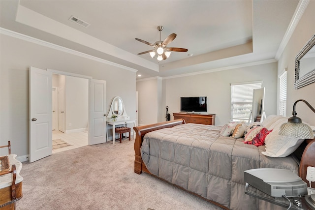 bedroom featuring a raised ceiling, light carpet, ceiling fan, and crown molding