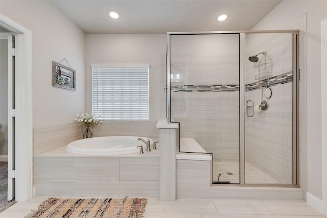 bathroom featuring plus walk in shower