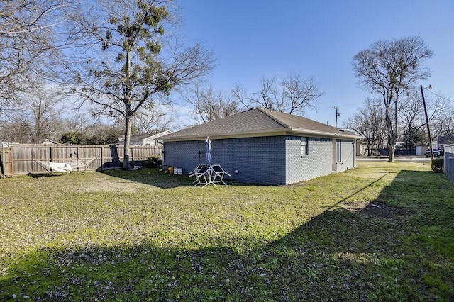 view of home's exterior featuring a lawn