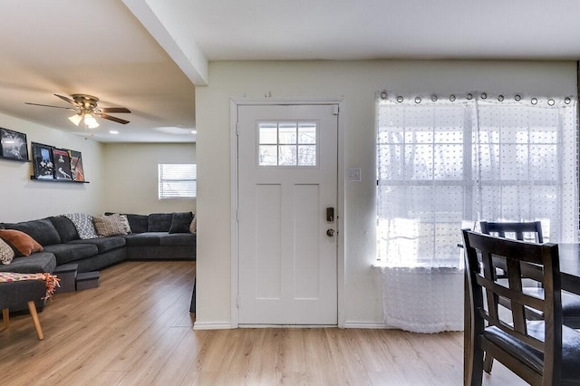 entrance foyer with light wood-type flooring and ceiling fan