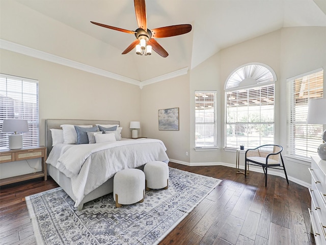 bedroom with vaulted ceiling, ceiling fan, and dark hardwood / wood-style floors