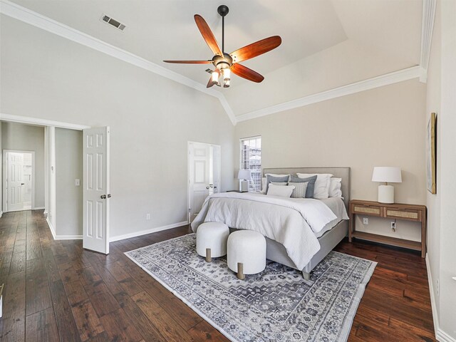 bedroom with ceiling fan, dark wood-type flooring, lofted ceiling, and crown molding