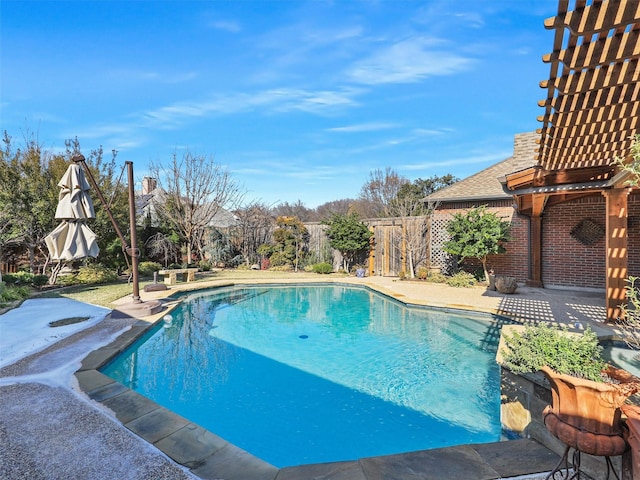 view of pool featuring a patio area and a pergola