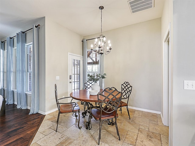 dining area with a chandelier