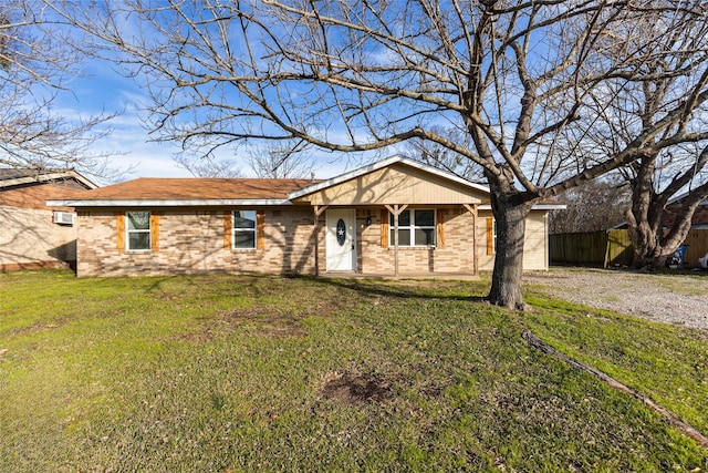 ranch-style house with a front yard