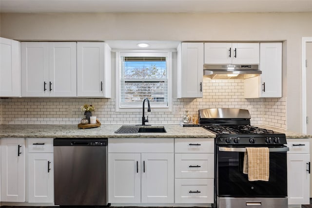 kitchen featuring sink, white cabinetry, range with gas cooktop, dishwasher, and decorative backsplash