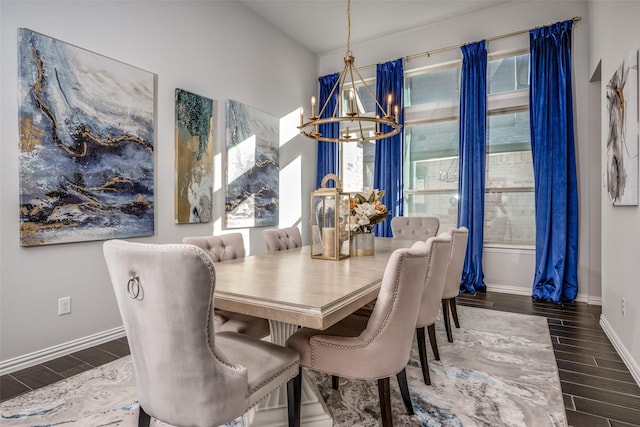 dining area featuring a chandelier